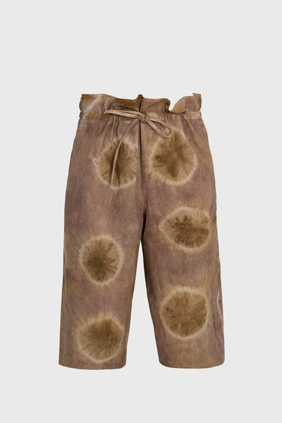 the new shorts for this summer, women and men, unisex design, naturally dyed, chemical free, high end young luxury, design oriented fashion, for a sustainable lifestyle, earth-tone colors, shibori circles