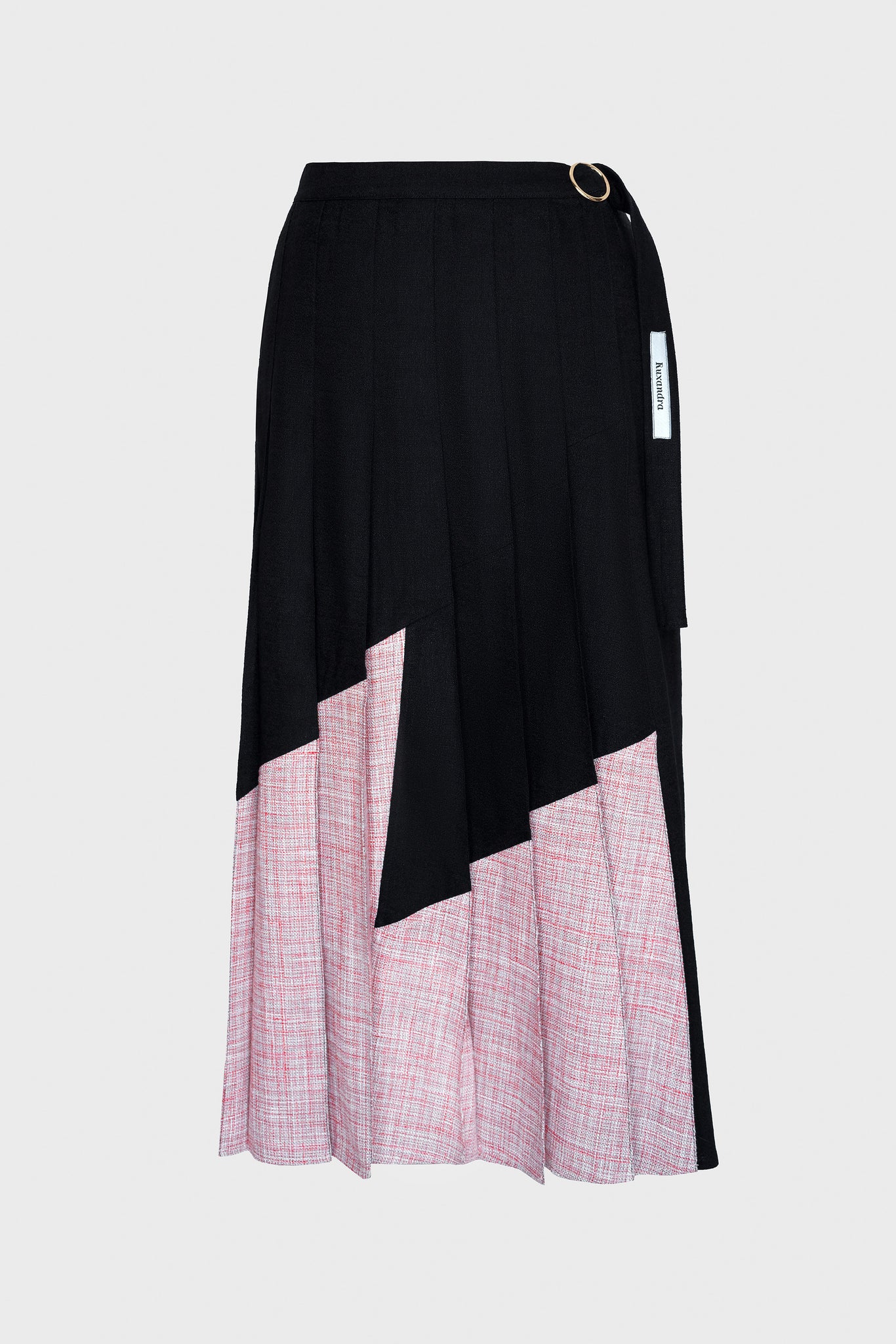 pleated skirt, midi length, crafted in Italian wool, waist band tied on the side, two tone, black and pink, asymmetrical, Spanish style