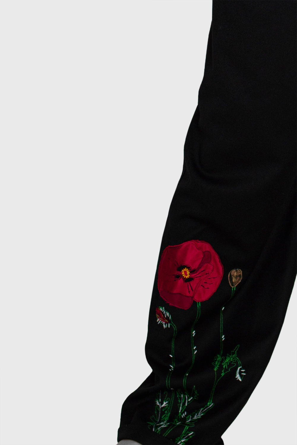 women's trousers, casual and office style, with an embroidery on one leg, discreet and beautiful wild poppy flower, for an artful touch to your look, luxury detail, red accent, silk