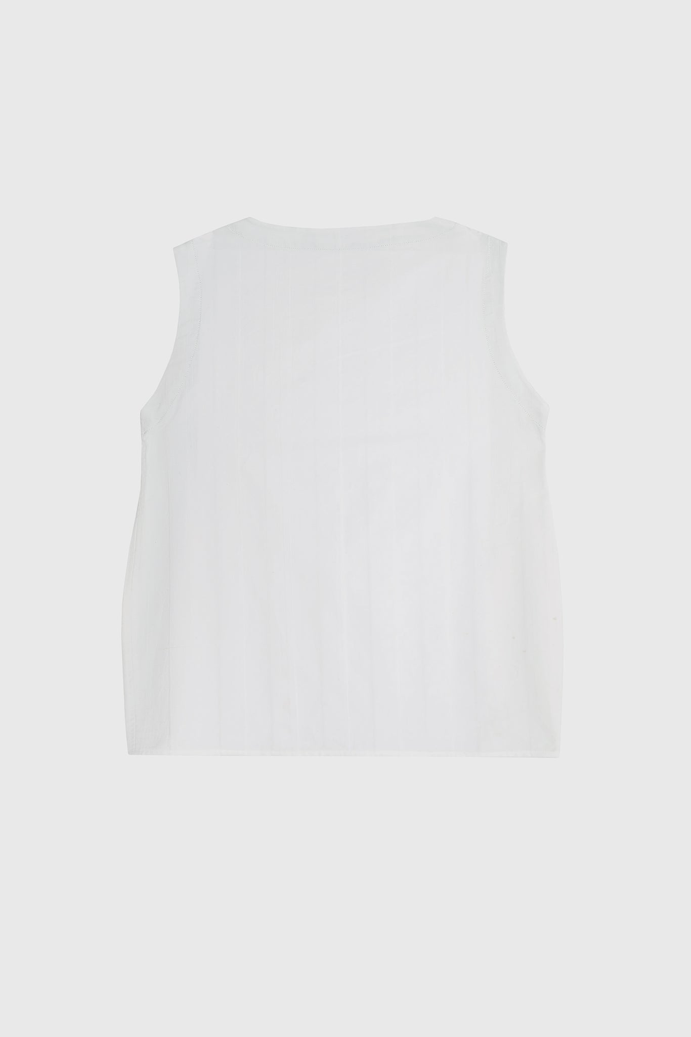 white Tee, sleeveless, from white damask cotton, the figure of a dog embroidered on the front