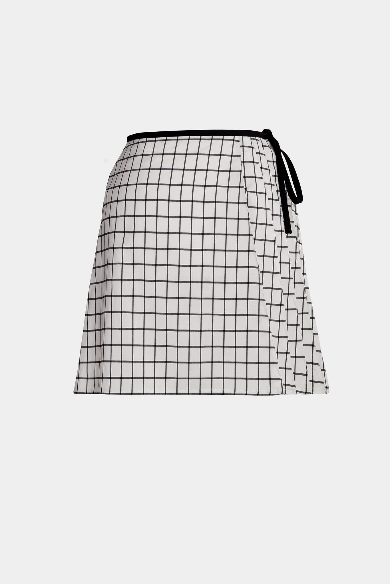 geometric mini skirt, grid pattern with pleats on the side, black cord around the waist fastening into a ribbon, serious and sophisticated avant-garde fashion, for young artists and architects