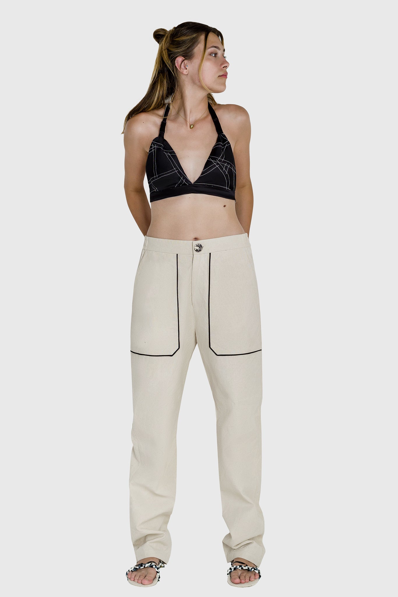 Ruxandra favorite fit, white cotton trousers, black silk bra, contrasting over-thread, front and back pockets, geometric cuts, modernist look 
