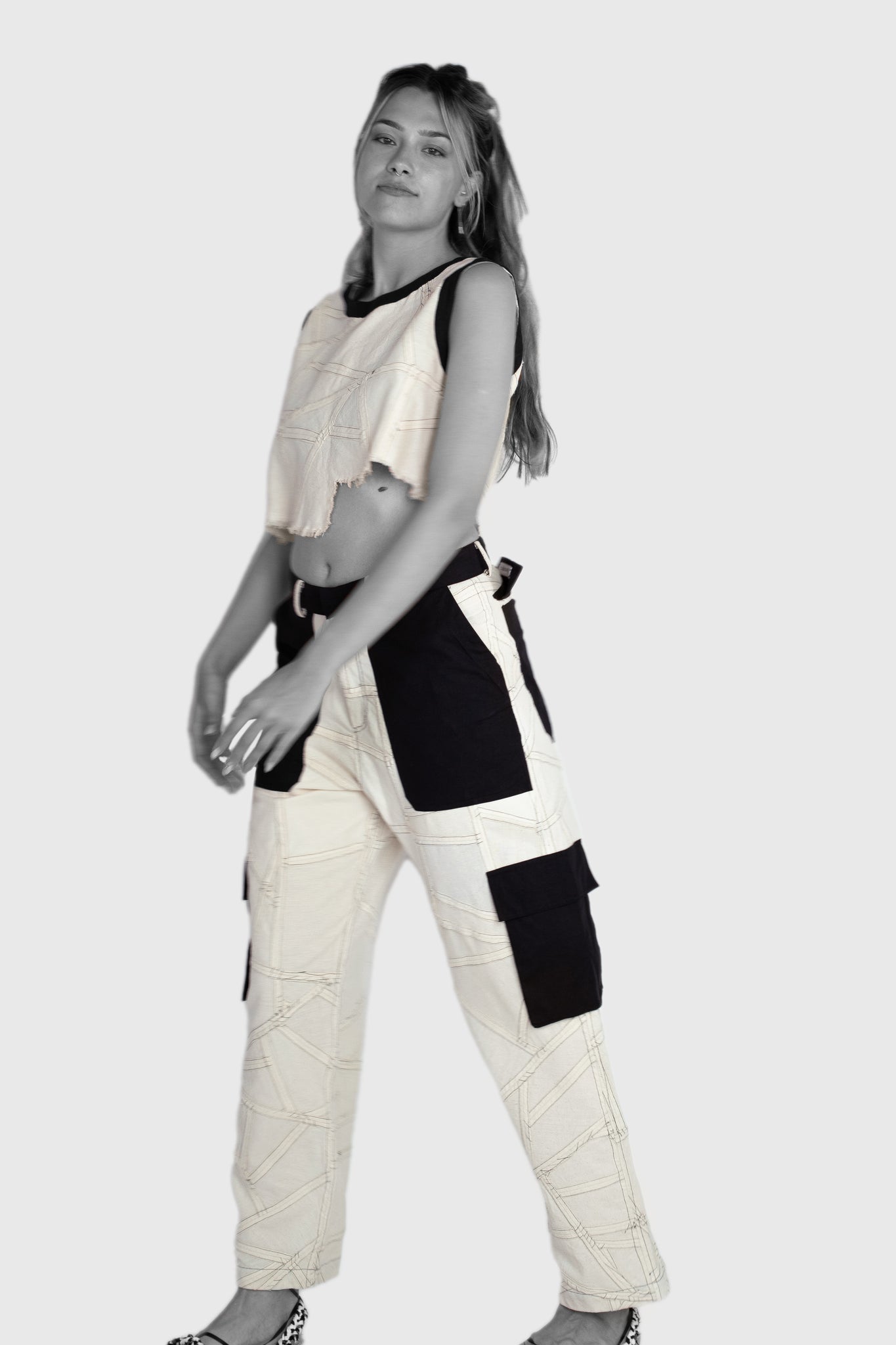 young teens look, women's top and cargo pants, clean geometric lines, Scandinavian colors, light and breathable cotton, recycled from leftover stock inside the atelier, sustainable fashion design, straight fit, high waist, with belt loops, easy to style with simple tee or bra and jacket