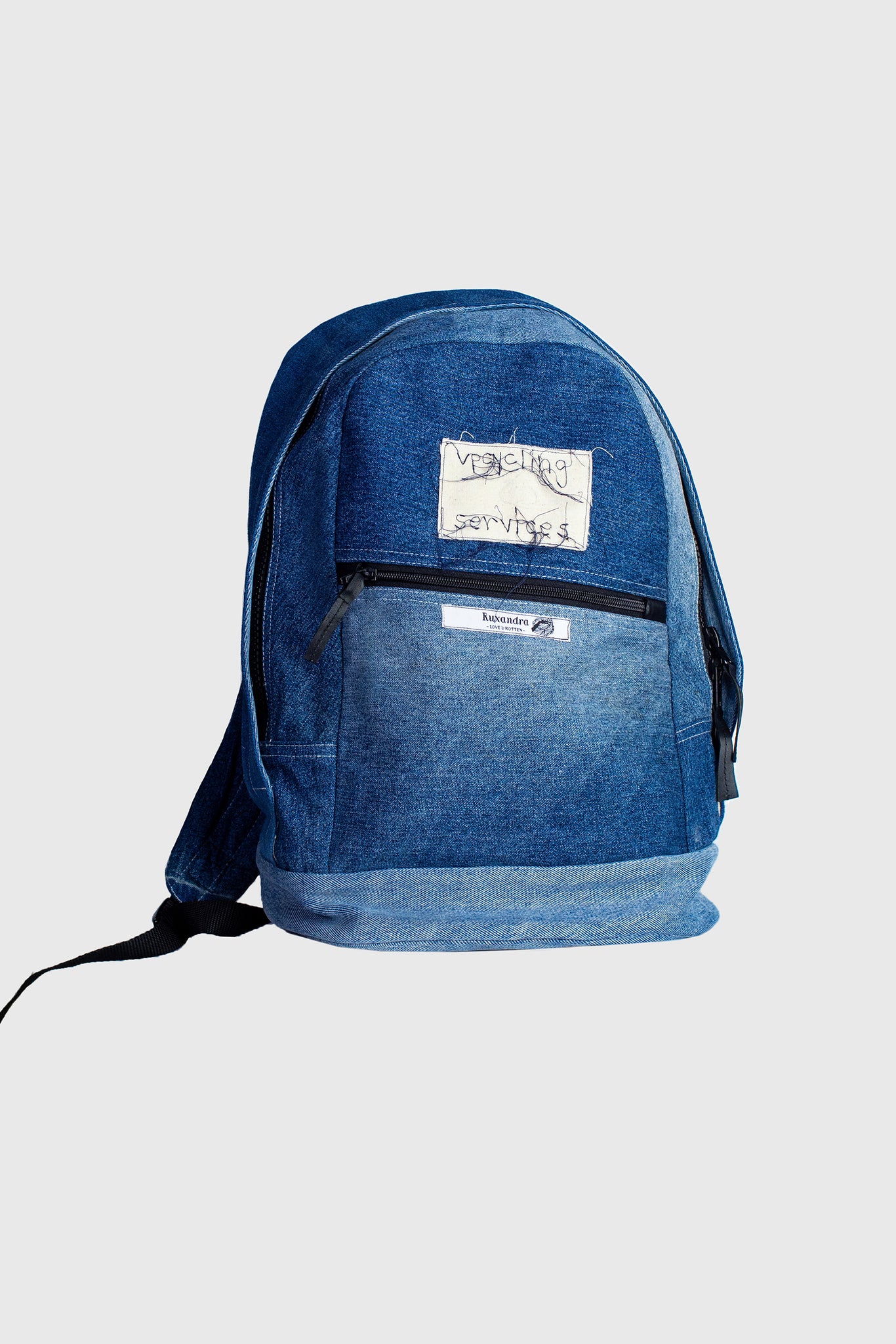 denim backpack, with a twist, created from upcycled vintage jeans, repurposed and contemporary, sustainable spirit, impressive detailing, cotton backpack, denim blue, repurposed, style with any jeans or denim jacket
