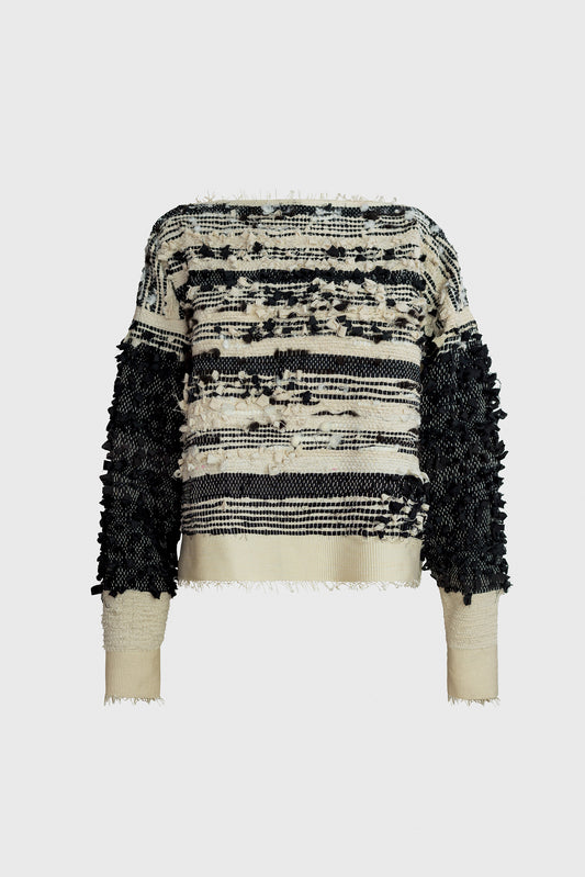 Ruxandra. art fashion, black and white sweater, woven from upcycled and recycled luxury wool textiles, 3d shapes extruded from the weaving, graphic expression, bottleneck, tight sleeves, playful shape, open neck look