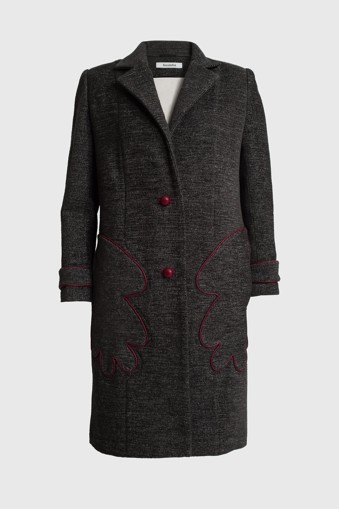 women's tailored coat, detailed with leather, leather covered buttons, hands shaped pockets on the outside, red outlines, pixel black cotton coat, cuffs, mid-length, lined