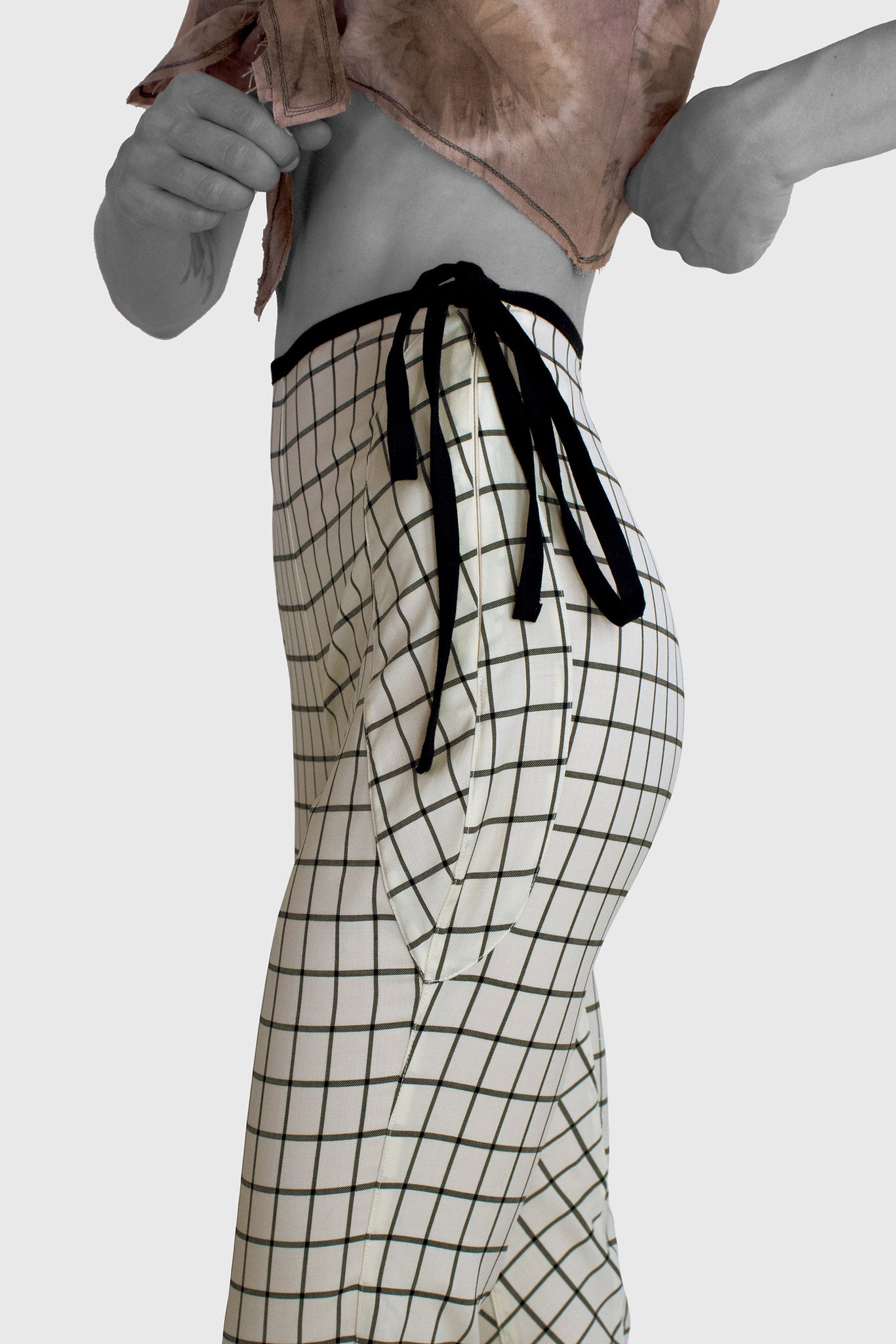 women's trousers, tailored shaped, slim fit, on the body, 100% wool, no elastane, side zipper closure with string, black on white grid pattern, elongating and slimming your legs, graphic contrast, Bauhaus style, artsy serious look, spring summer outfit by Ruxandra